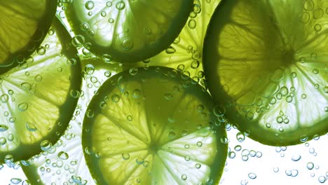 Lime-Slices-falling-deeply-under-water.-Shot-on-super-slow-motion-camera-1000-fps.