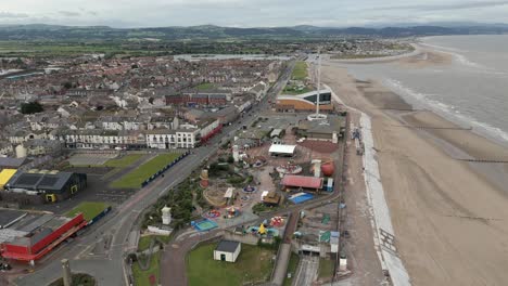 An-aerial-view-of-the-of-the-Welsh-town-of-Rhyl-in-Denbighshire,-North-Wales,-on-an-overcast-morning