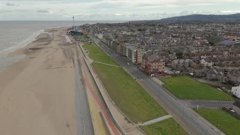 An-aerial-view-of-the-of-the-Welsh-town-of-Rhyl-in-Denbighshire,-North-Wales,-on-an-overcast-morning