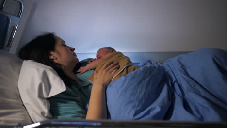 Adorable-scene-of-a-newborn-and-mother-together-in-hospital