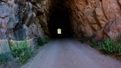 POV---driving-through-Adelaide-Old-Railroad-Tunnel-on-Phantom-Canyon-Road