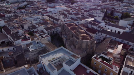 Church-of-San-Marcos,-Jerez-de-la-Frontera-Aerial-Orbit-Reveal-Horizon