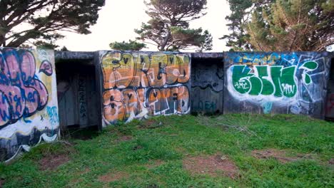 WW2-bunkers-sprayed-with-artist-graffiti-at-The-Massey-Memorial-on-Point-Halswell-in-Wellington,-New-Zealand-Aotearoa