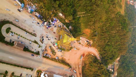 Vertical-aerial-shot-of-the-Laos,-Boten-International-border-checkpoint-facade-in-the-Chinese-Laotian-special-economic-zone