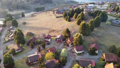 4K-Drone-shot-of-a-Swiss-style-resort-in-Tasmania-,-Australia