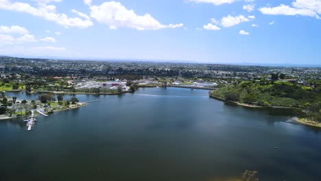 Aerial-drone-view-of-Lake-Murray-Reservoir-CA-on-a-sunny-cloudy-day