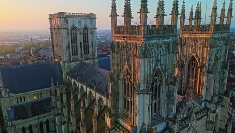 Closeup-Establishing-Aerial-Drone-Shot-around-York-Minster-Towers-at-Beautiful-Sunrise-UK