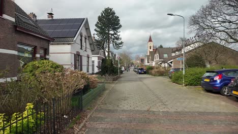 Pov-charming-street-in-Oosterbeek-village,-Gelderland,-the-Netherlands