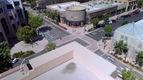 Aerial-view-tilting-over-the-downtown-of-Valencia,-sunny-Santa-Clarita,-USA