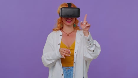 Girl-using-virtual-reality-futuristic-technology-VR-headset-helmet-to-play-simulation-3D-video-game