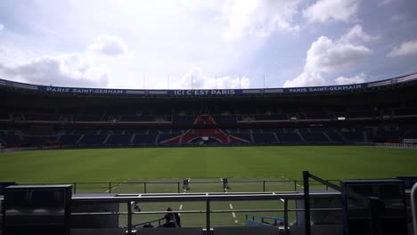 Soccer-field-stadium-at-Parc-des-Princes-home-of-Paris-Saint-Germain-Football-team,-Aerial-dolly-in-shot