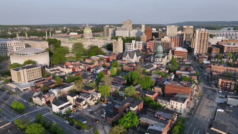 Aerial-circling-shot-of-Harrisburg-City-during-golden-sunset