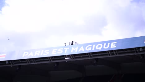 Sign-of-Paris-est-Magique-sign-or-Paris-is-Magic-at-Parc-de-Princes-soccer-stadium-home-of-Paris-Saint-Germain,-Close-up-shot