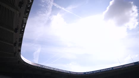 Soccer-stadium-roof-outline-at-Parc-des-Princes-home-of-Paris-Saint-Germain-Football-team,-Pan-right-shot