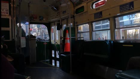 Riding-on-Bus-at-Market-Street,-Downtown-San-Francisco,-California-USA,-Passenger-POV