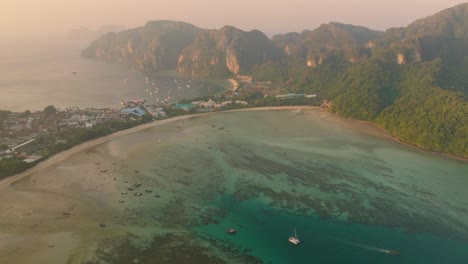 4K-aerial-drone-footage-of-Phi-Phi-Island-during-a-sunset,-Thailand,-Koh-Phi-Phi,-Asia