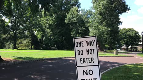 One-Way,-Do-Not-Enter,-No-Exit-signs-in-a-park