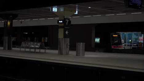 Commuter-walk-out-of-Transperth-train-on-platform-train-station