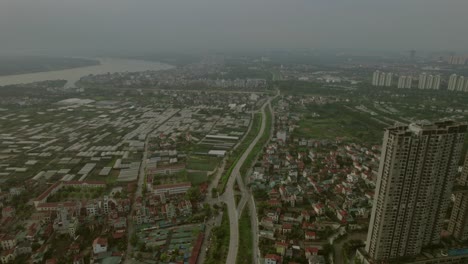 Aerial-above-suburbs-of-Hanoi-city-skyline-view