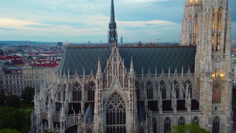 Drone-orbiting-movement-at-the-Votive-Church-in-Vienna,-Austria