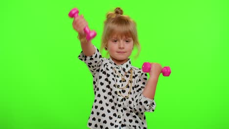 Sportive-kid-girl-working-out,-pumping-up-arm-muscles-lifting-pink-dumbbells,-practicing-pilates