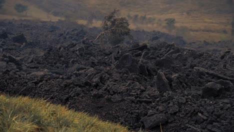 Serene-footage-of-lava-rivers-flowing-at-dusk-over-farms-around-Pacaya-Volcano