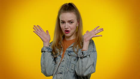 Student-girl-in-denim-jacket-closing-eyes-showing-stop-gesture,-confused-shy-scared-to-watch