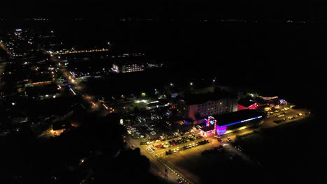 Aerial:-Nightlife-at-Marriot-hotel-and-Riviera-Casino-in-december,-with-colorful-lights