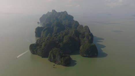 4K-aerial-drone-footage-of-green-Thai-island,-dramatic,-adventure