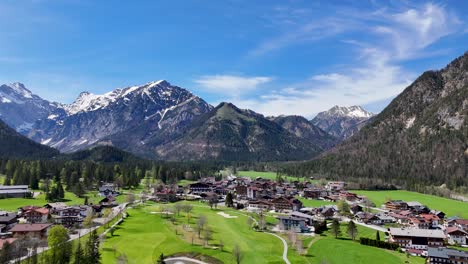 Drone-shot--with-houses-and-river-Austria,-Hallstatt,Gosau