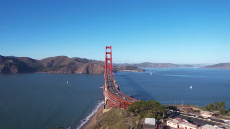 Aerial-View-of-Golden-Gate-Bridge-on-Sunny-Day,-Traffic-and-Bay,-San-Francisco,-California-USA