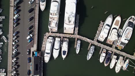 Overhead-drone-shot-of-luxury-Yachts-and-boats-in-the-Hamptons,-Long-Island