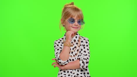 Smiling-pretty-little-stylish-blonde-teen-child-kid-girl-posing-isolated-on-chroma-key-background