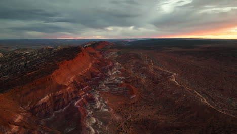 Utah-Landscape-With-Striped-Sandstone-Mountains-At-Sunset---Aerial-Drone-Shot