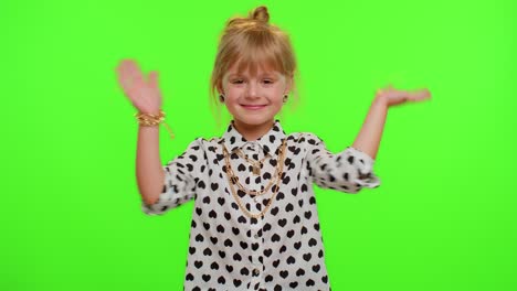 Little-blonde-child-kid-girl-waves-hand-palm-in-hello-gesture-welcomes-someone,-positive-emotions