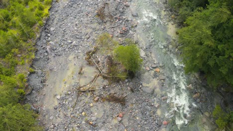 Drone-view-of-forest-and-River-in-the-Spruga-area-of-Locarno-in-the-Alps,-Switzerland