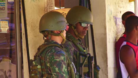 Military-police-armed-with-assault-rifles-fight-organized-drug-gangs-in-the-favela