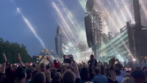 Side-On-Shot-Of-Fans-Jumping-And-Enjoying-Themselves-At-A-Rammstein-Concert