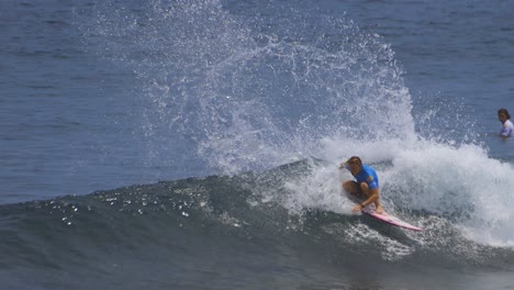 surfer-surfing-a-wave-doing-a-long-run-of-tricks-carving-and-turning