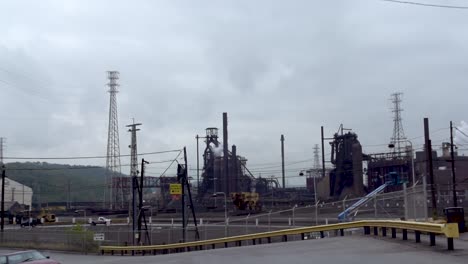 Smoke-from-the-US-Steel-Edgar-Thomson-steel-plant-in-Braddock,-Pennsylvania-Entrance-to-the-property