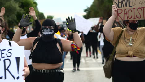 Crowd-of-protestors-walking-past-camera-during-Black-Lives-Matter-protest