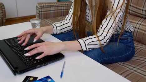 Joyful-girl-reading-good-news-on-laptop,-celebrating-lottery-victory,-enjoy-success-shopping