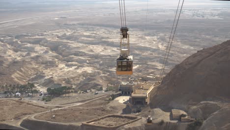 Masada-cableway-cable-car-descending-from-ancient-fortress-of-Masada,-Israel