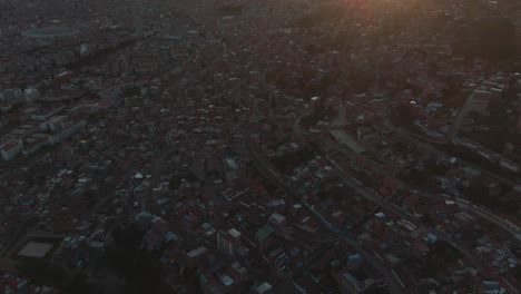 4K-daytime-aerial-drone-view-over-the-Lucrepata-and-San-Blas-neighborhoods-in-Cusco,-capital-of-the-Inca-at-sunset