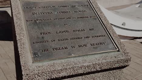 A-shot-of-the-plaque-which-commemorates-the-opening-of-the-Tunnel-North-by-the-Trans-Caledon-Tunnel-Authority,-the-tunnel-forming-part-of-the-Lesotho-Highlands-Water-Project,-Free-State,-South-Africa