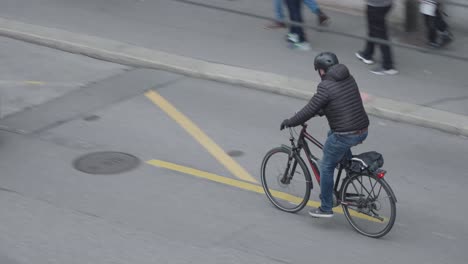 Road-traffic,-top-view-on-moving-cars-and-bicycle-bike