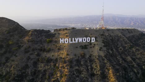 Aerial-view-around-the-Hollywood-sign,-on-top-of-mount-Hollywood-in-Los-Angeles,-USA---circling,-drone-shot