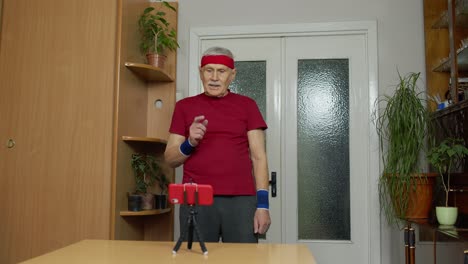 Senior-grandfather-man-doing-workout-training,-fitness,-sport-activity-at-home-during-coronavirus