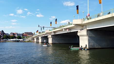 Motion-Time-Lapse-of-Boat-Traffic-and-Rowing-Sport-Event-on-Neckar-River-in-Heidelberg-City