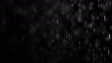 Real-rain-drops-falling-or-snow-4K-alpha-channel-footage.-Heavy-rain-fall,-rainstorm,-snowfall